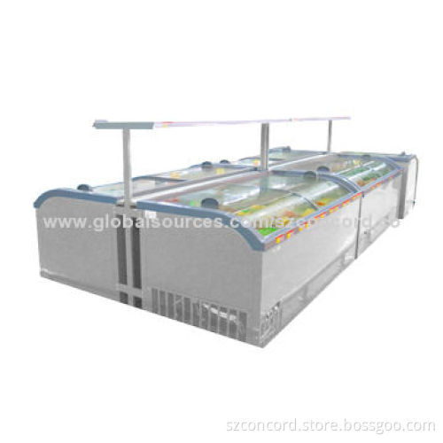 Freezers island showcase with totally-enclosed compressor